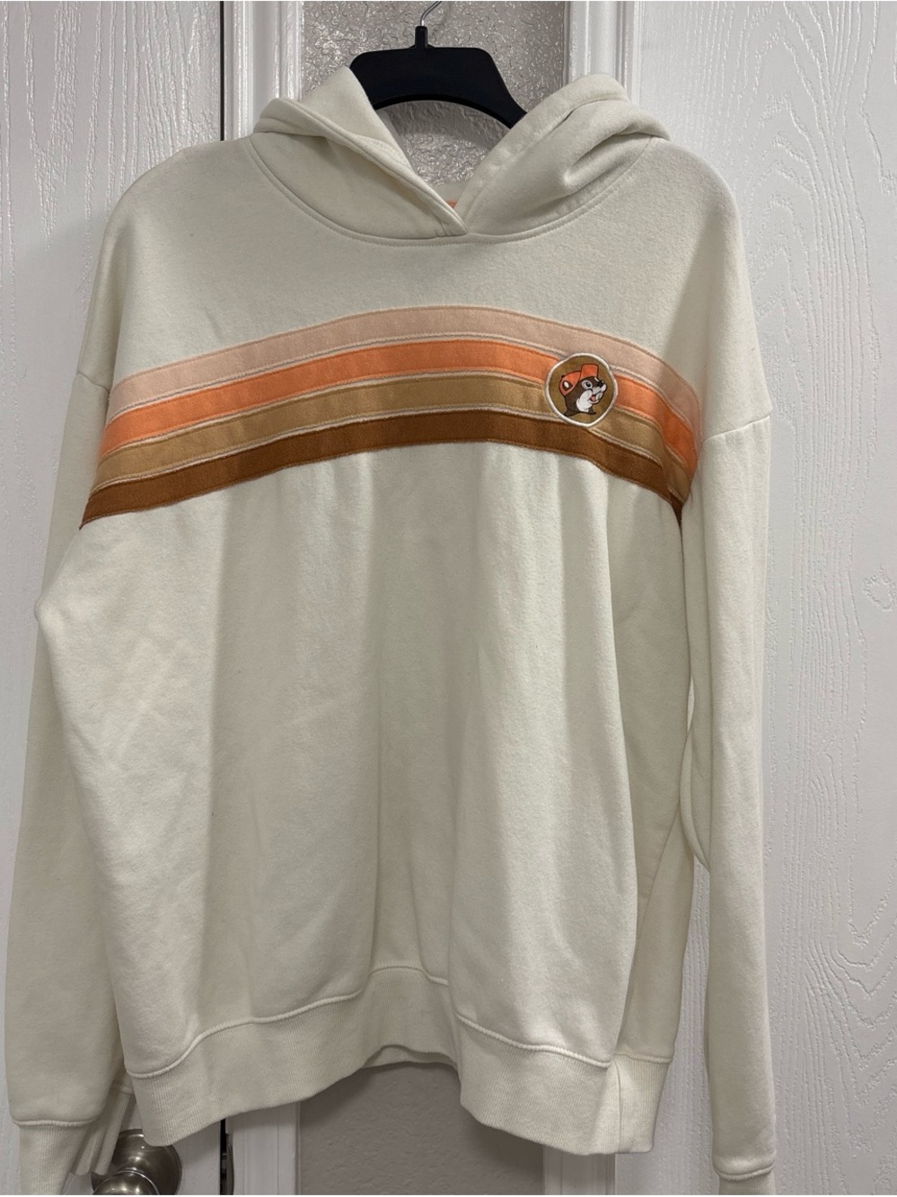 Cream Hoodie with Orange and Brown Stripe Chest Detail